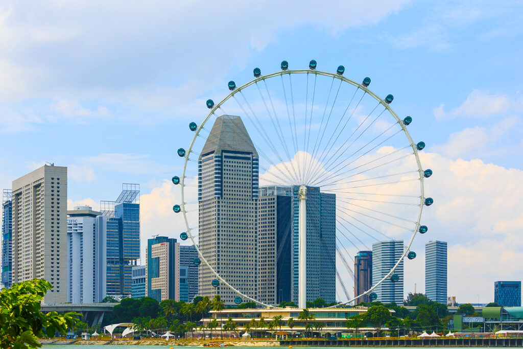 The Ritz-Carlton, Millenia Singapore with the Singapore Flyer